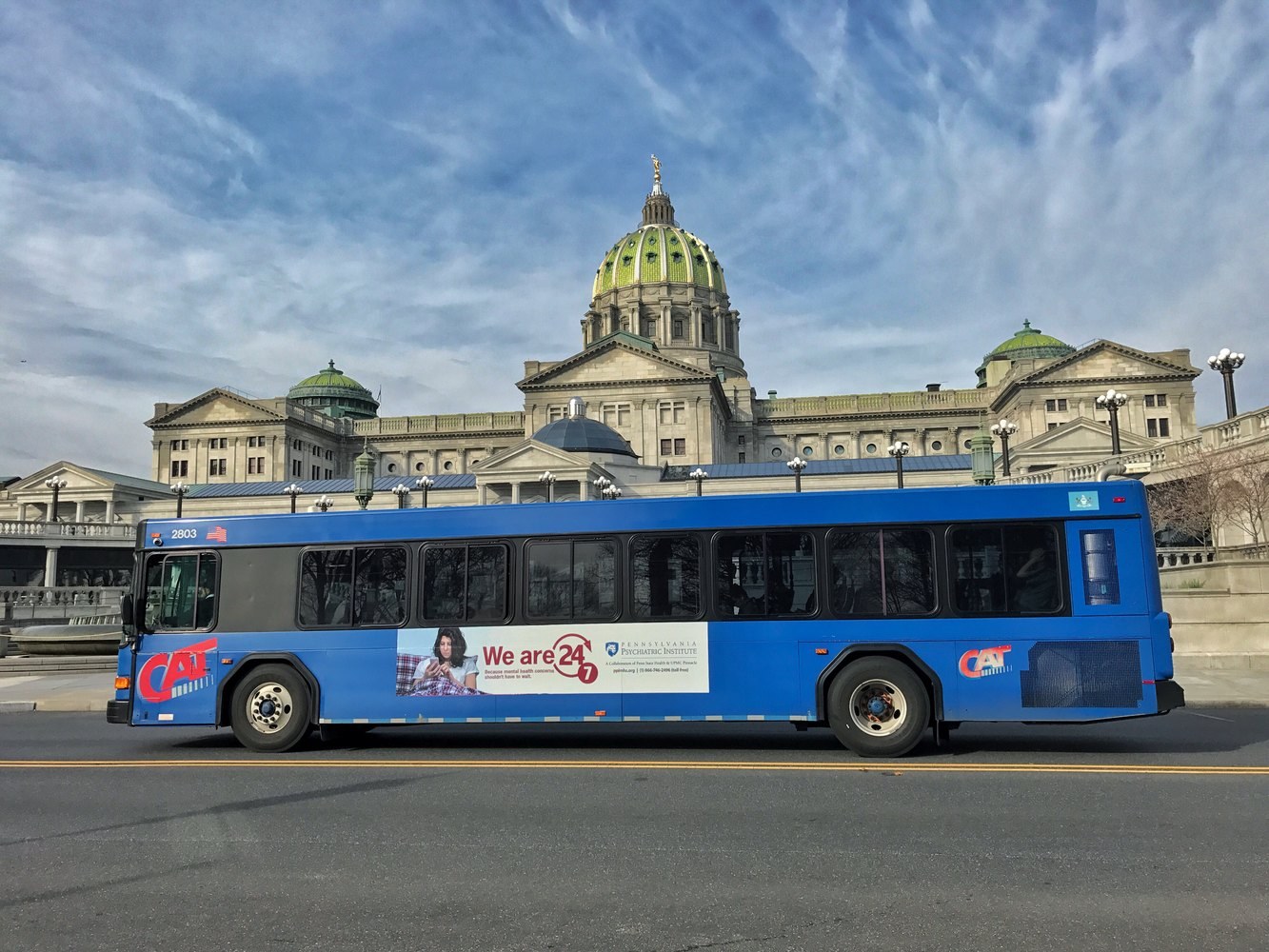 Capital Area Transit bus in Harrisburg with the Pennsylvania Capitol in the background