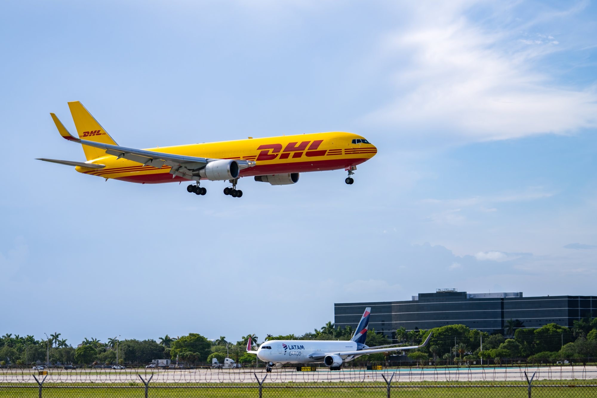 DHL cargo plane landing near Miami International Airport