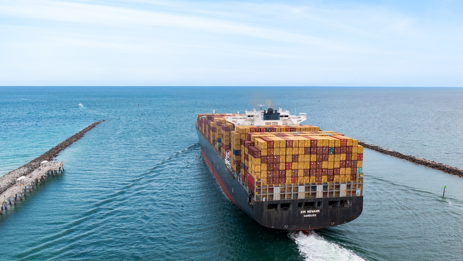 Container ship entering PortMiami through the ocean channel
