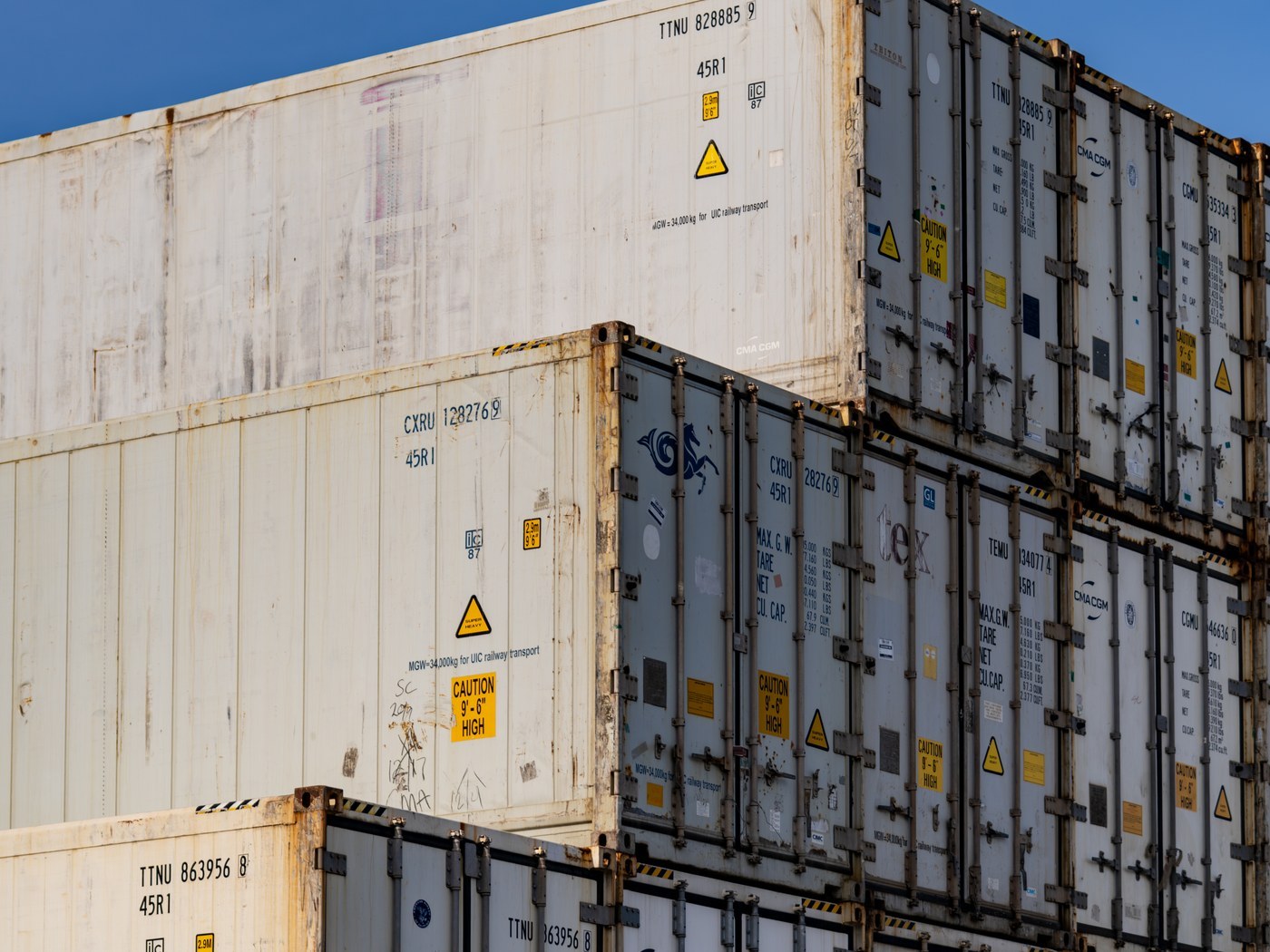 Stacked freight containers at a Miami-Dade cargo facility