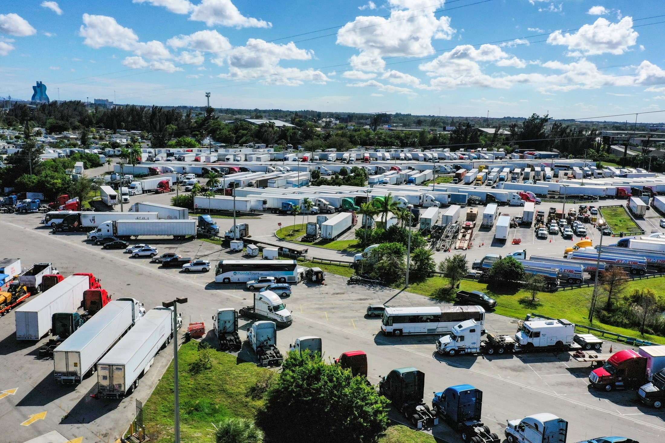 Aerial view of trucks parked in a freight and logistics area